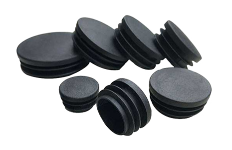 Selection of round plastic inserts.