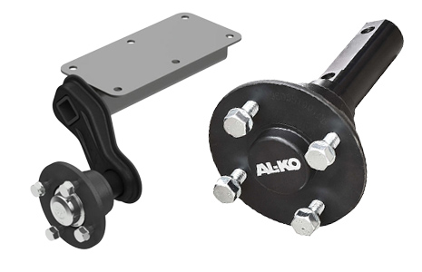 Selection of trailer axles and suspension units.