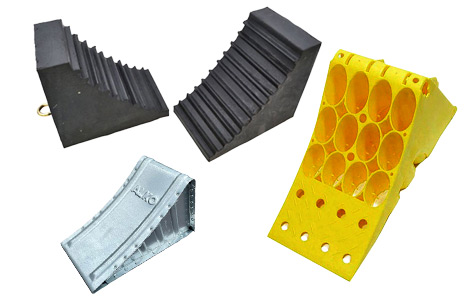 Selection of wheel chocks and holders.
